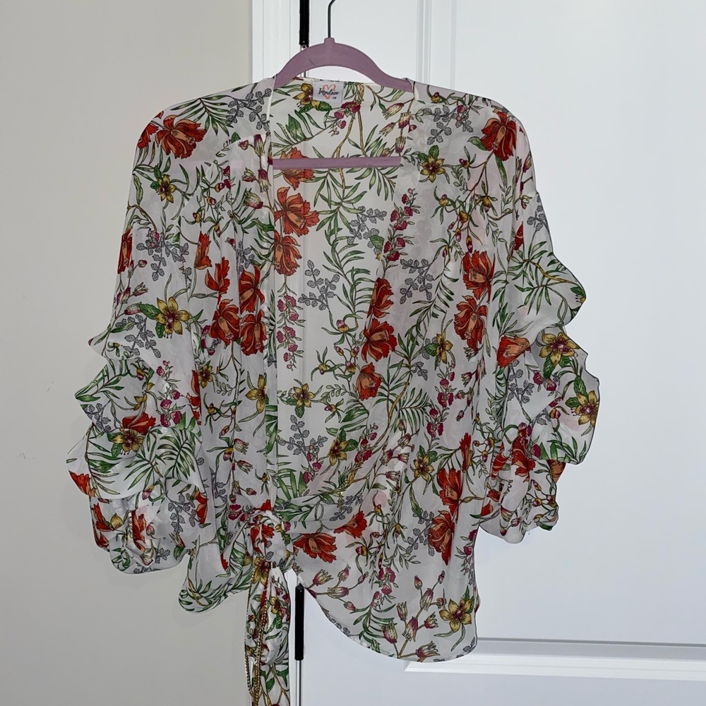 Floral plunge cut blouse.